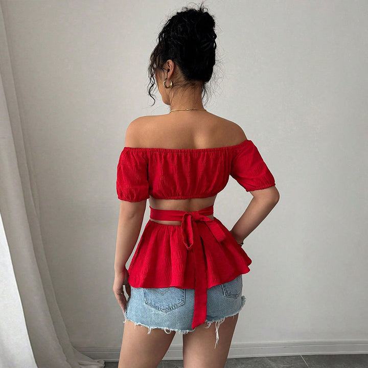 Blouse femme à épaules dénudées avec ourlet froncé et découpes latérales Levoire