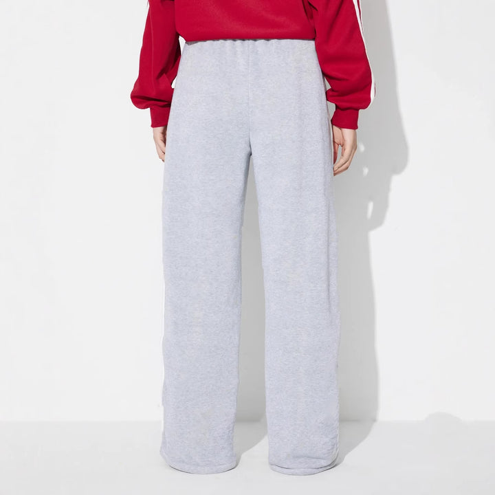 Pantalons d'entraînement décontractés pour femmes dans une coupe moderne avec une taille élastique et des inserts latéraux stylés Levoire