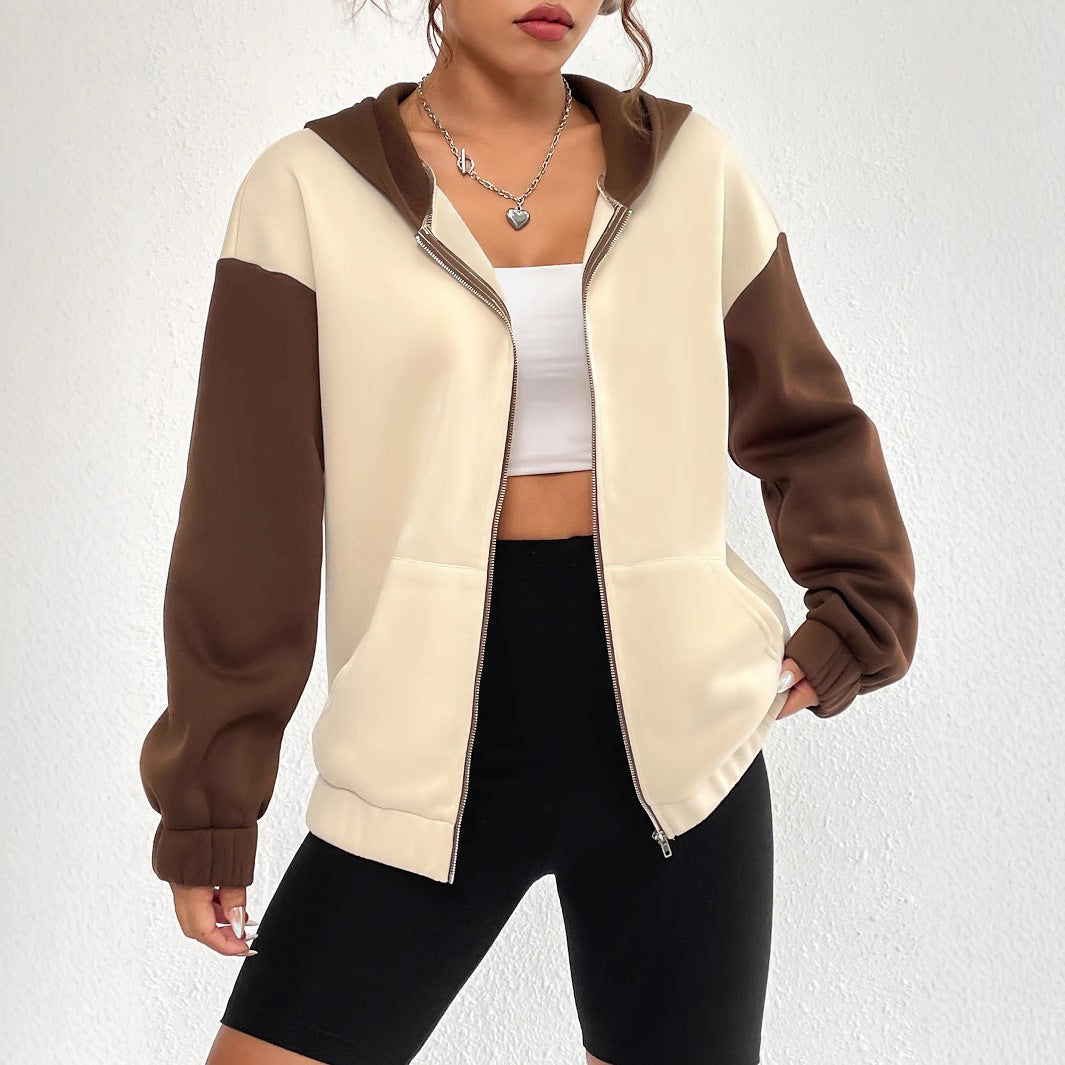 Veste sweatshirt décontractée pour femmes avec manches et capuche contrastantes Levoire