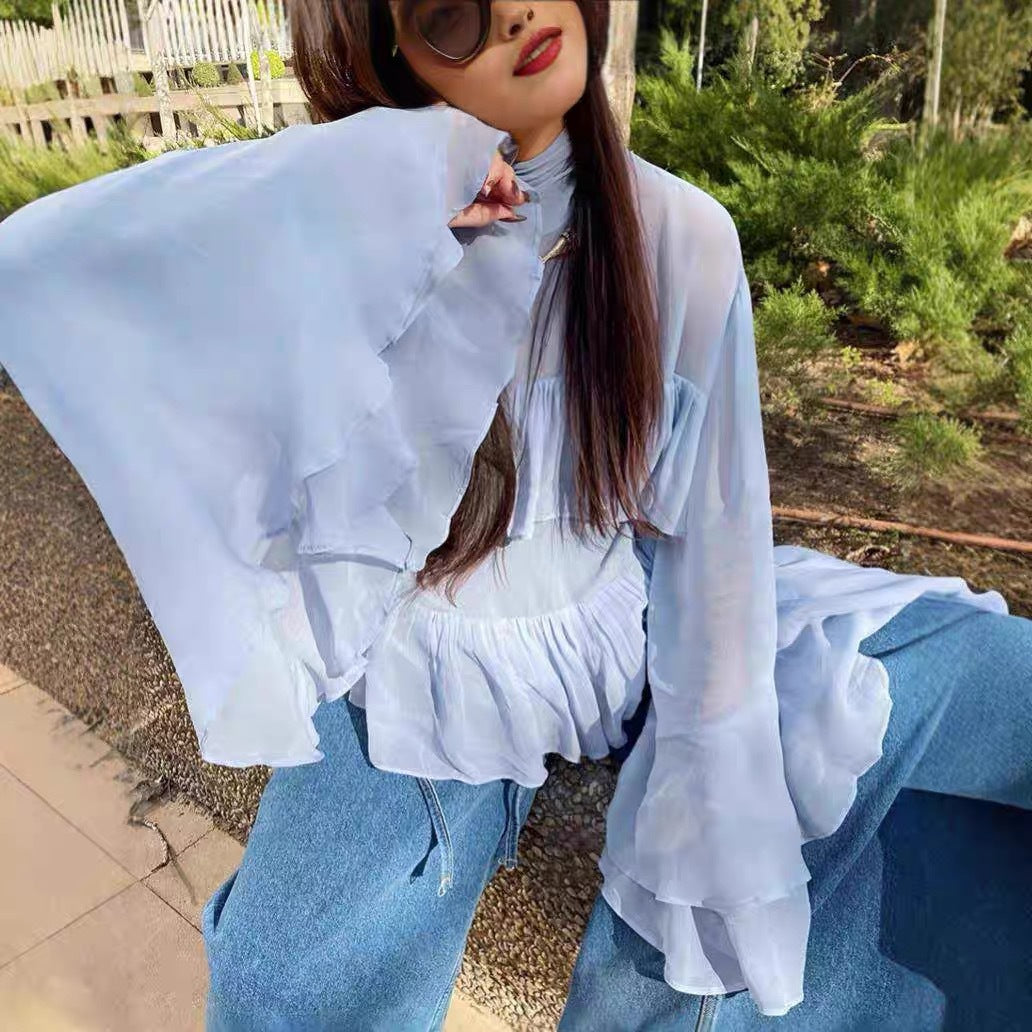 Blouse pour femmes avec un design de volants volumineux et des manches larges et flottantes Levoire