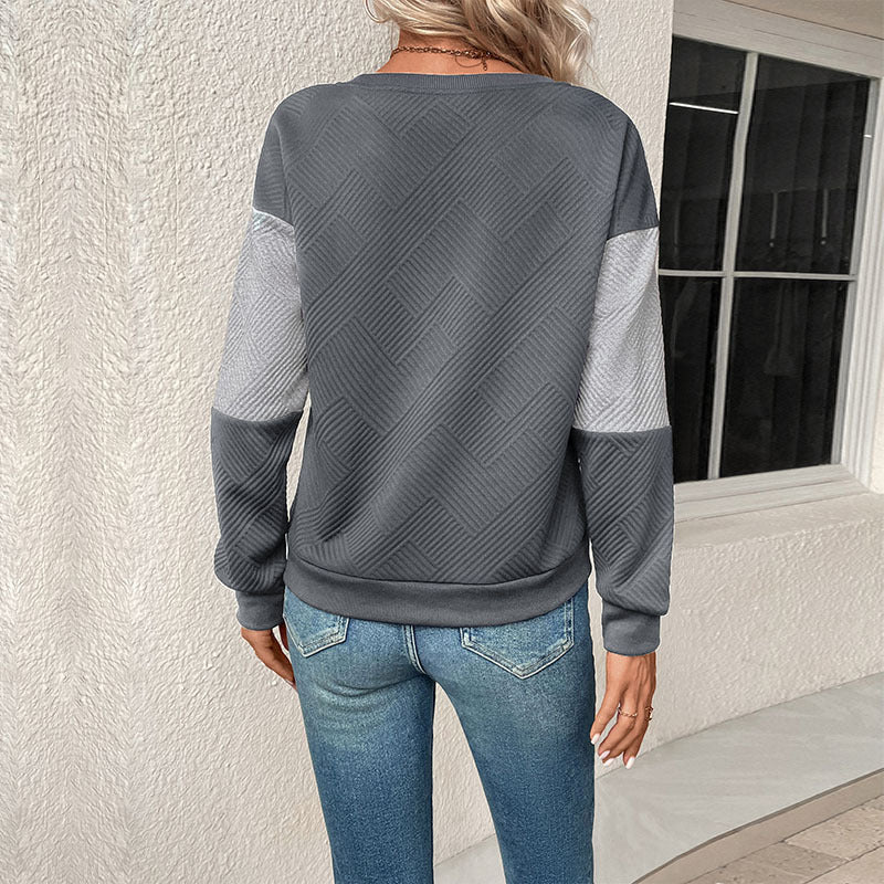 Sweat-shirt féminin à la mode avec design à rayures bloc et col rond Levoire