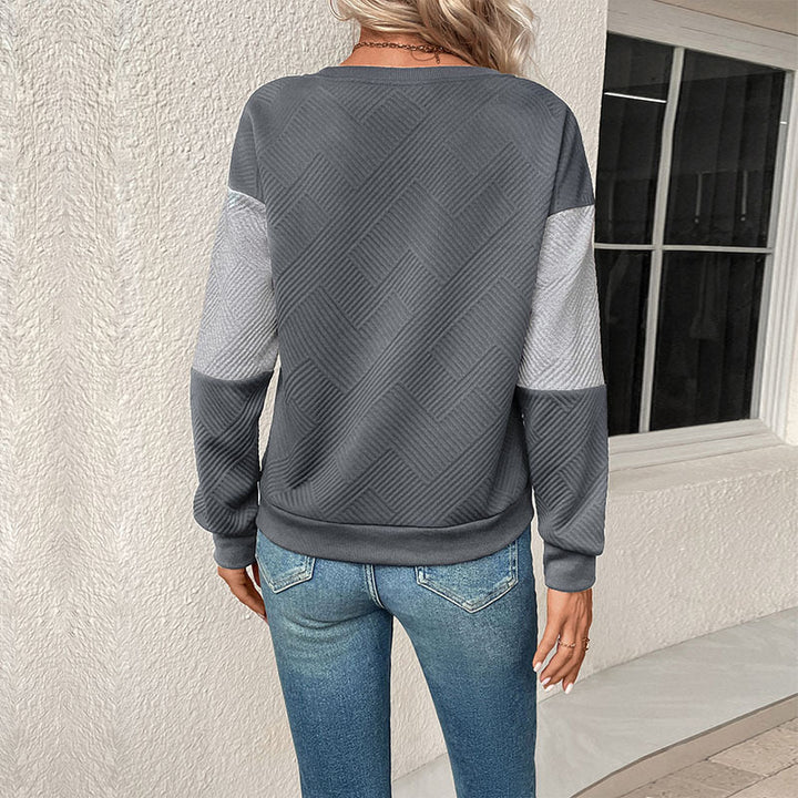 Sweat-shirt féminin à la mode avec design à rayures bloc et col rond Levoire