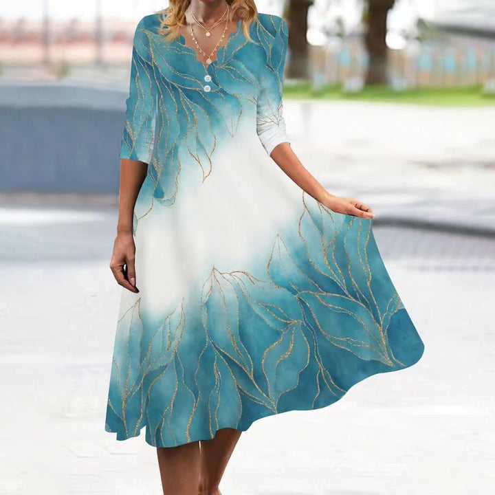 Levoire | Élégante robe mi-longue à manches avec imprimé printanier A3