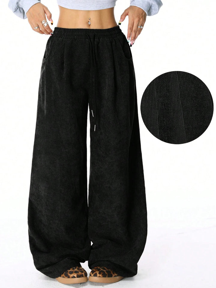 Pantalon large en corduroy à la mode pour femmes avec taille élastique et poches pratiques Levoire