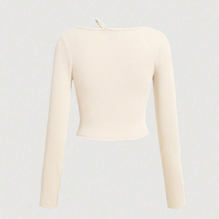 Chemise courte à manches longues pour femmes avec encolure asymétrique et texture fine côtelée Levoire
