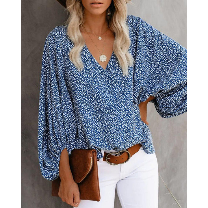 Blouse féminine à la mode avec des manches larges et un col en V Levoire
