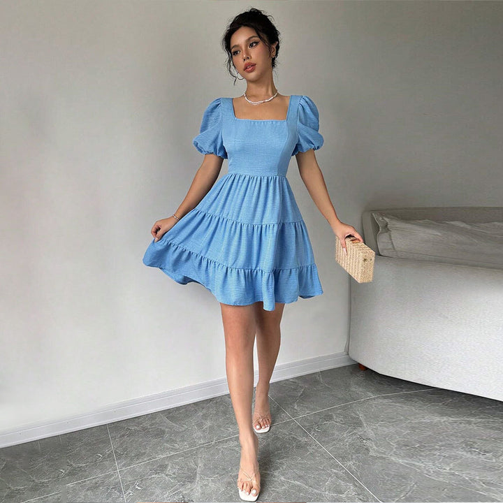 Robe pour femmes avec des manches bouffantes et un ourlet à volants Levoire