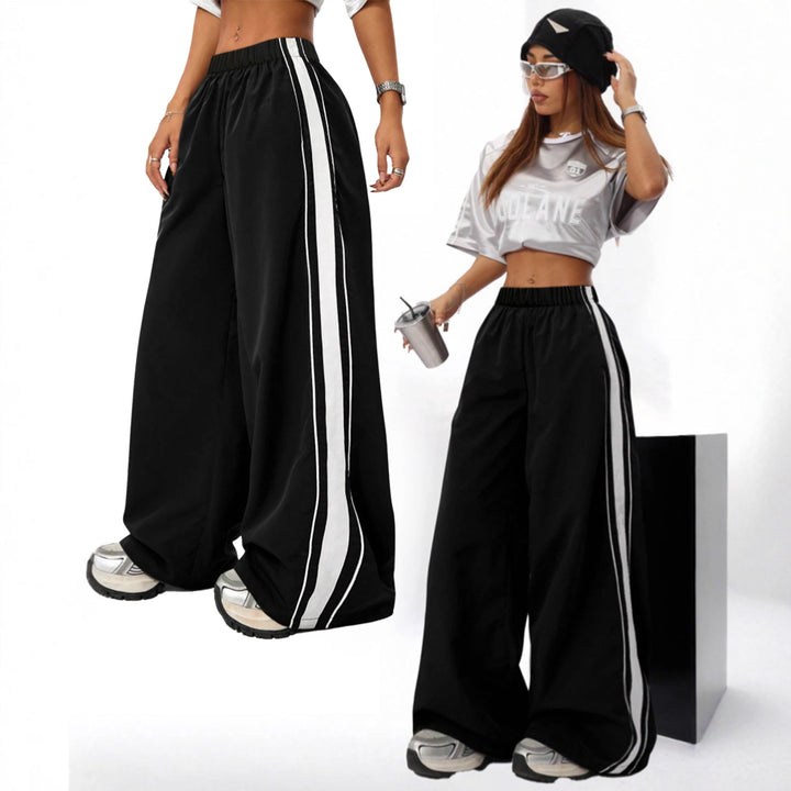Pantalons de sport larges pour femmes avec des rayures contrastées sur les côtés Levoire