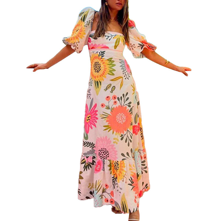 Robe maxi femme avec manches bouffantes et détails imprimés floraux Levoire