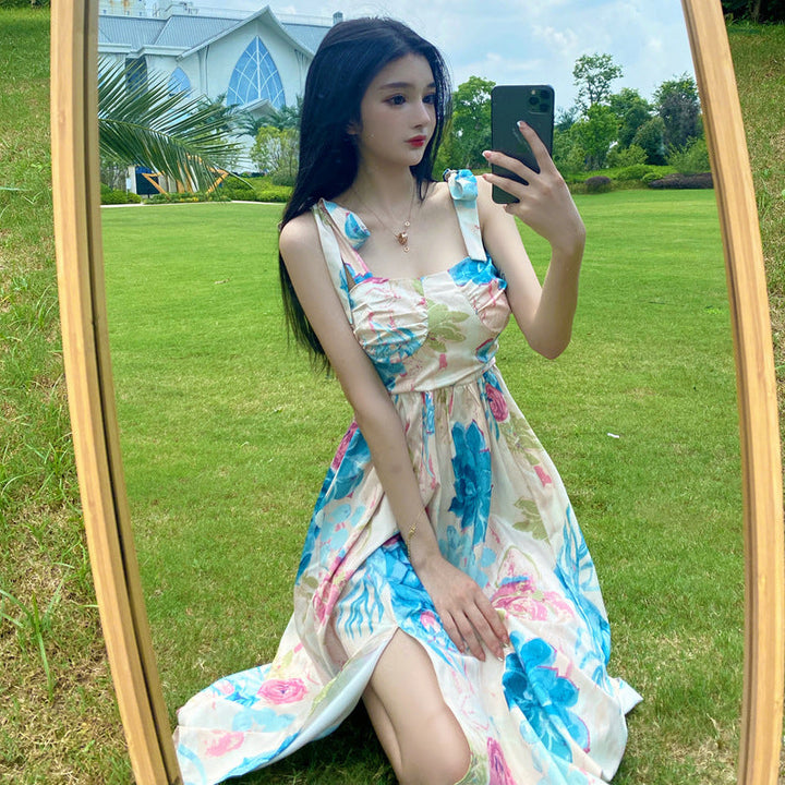Levoire | Robe à fleurs Retro robe à taille cintrée à motif floral