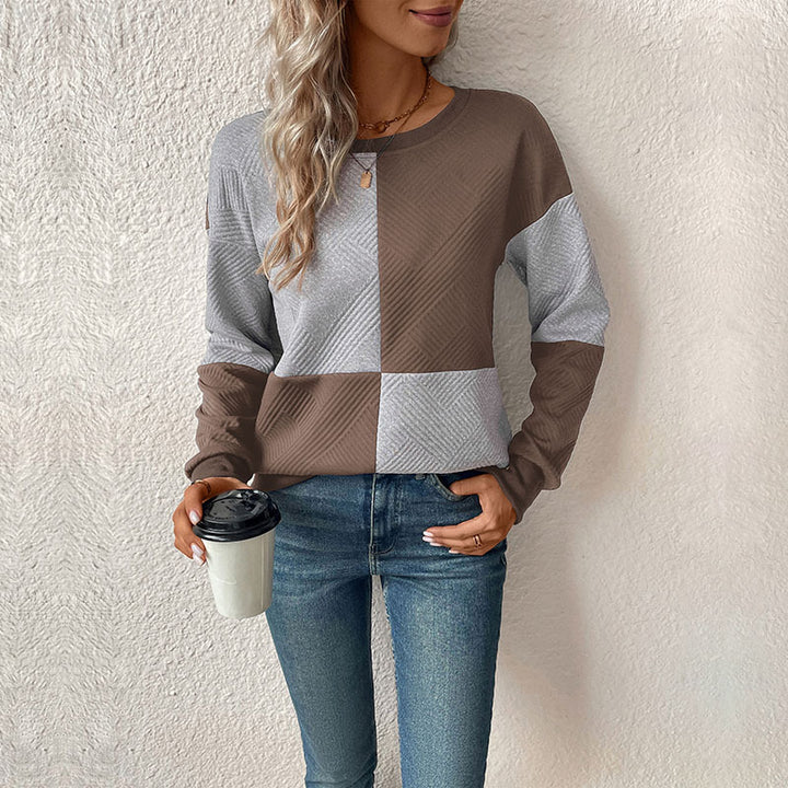 Sweat-shirt féminin à la mode avec design à rayures bloc et col rond Levoire