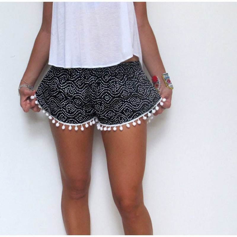 Shorts d'été pour femmes avec des détails de pompons ludiques et un motif de vagues tendance Levoire