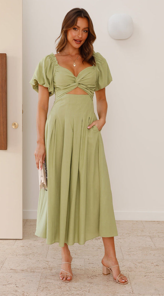 Robe midi femme avec un détail de nœud ludique et un design à manches bouffantes Levoire