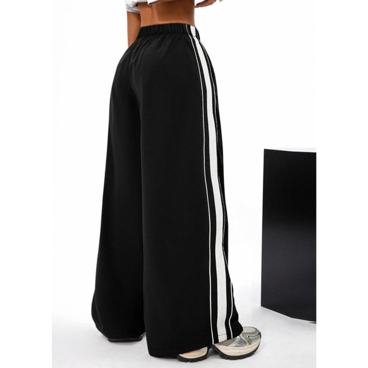Pantalons de sport larges pour femmes avec des rayures contrastées sur les côtés Levoire
