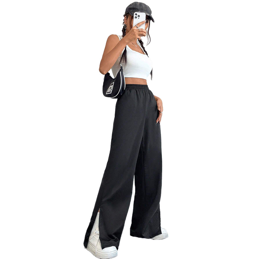 Pantalons satinés larges pour femmes avec taille élastique et fentes latérales Levoire