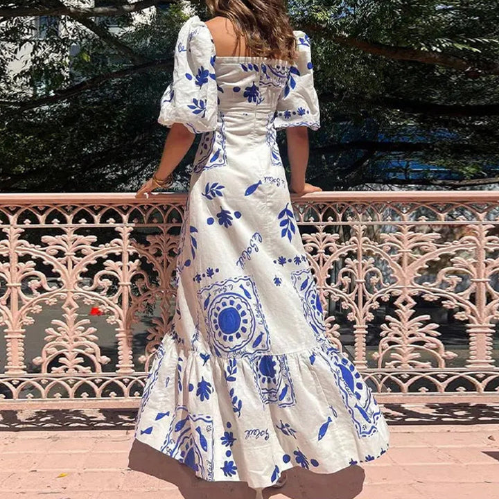 Robe maxi femme avec manches bouffantes et détails imprimés floraux Levoire