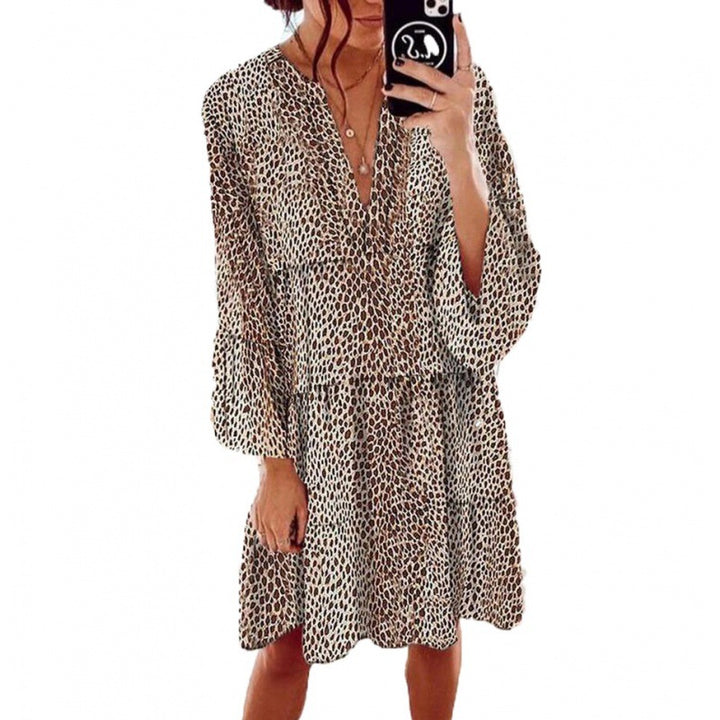 Robe maxi femme avec un élégant col en V et des manches volumineuses Levoire