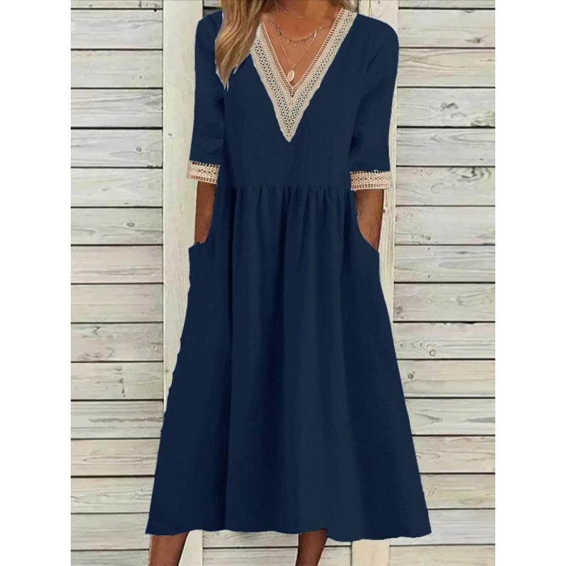 Levoire | Élégante robe mi-longue à col V en dentelle à manches mi-longues Meriheinä