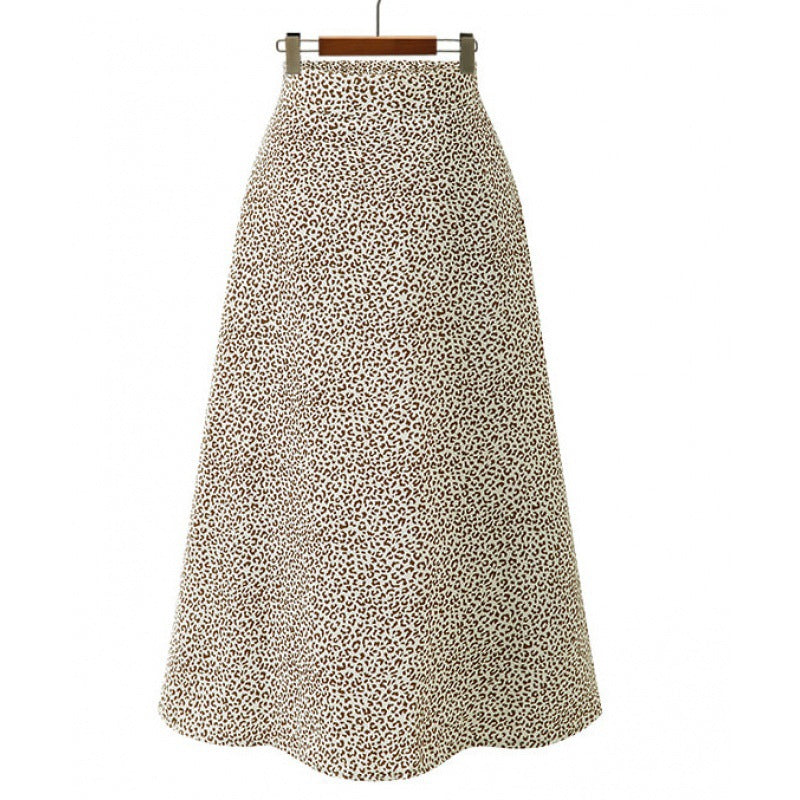 Jupe midi pour femmes avec une coupe élégante en A et un design à pois à la mode Levoire