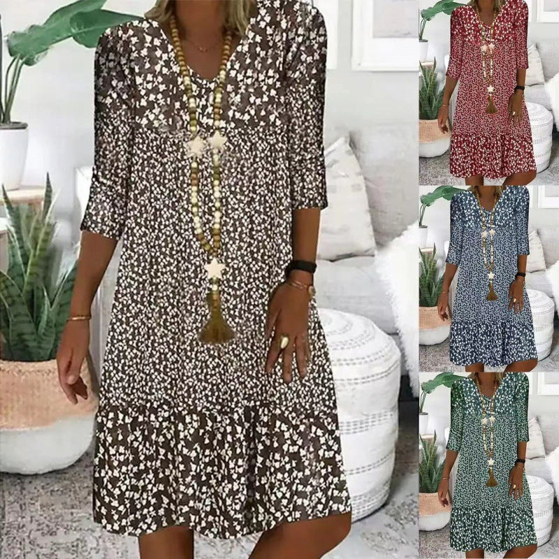 Levoire | Robe midi à col en V avec manches trois quarts à imprimé élégant