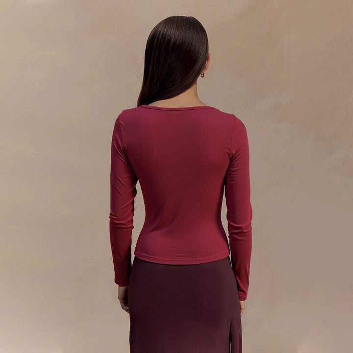 Haut femme avec détail de nœud raffiné et élégant décolleté en V Levoire