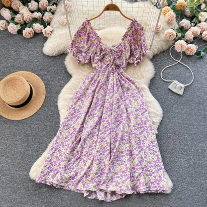 Levoire | Robe rétro à imprimé floral avec encolure en V Tummalilaakki Taille libre