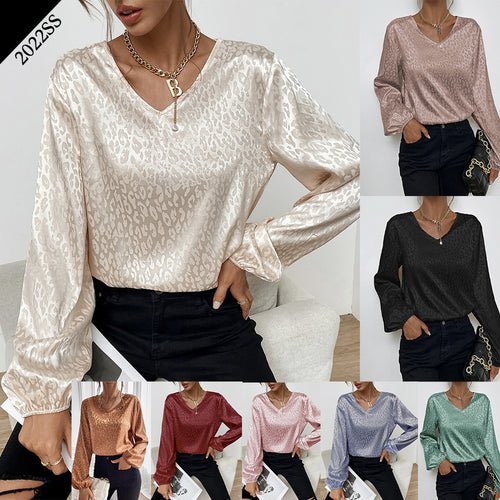Blouse élégante pour femmes avec un col en V moderne et un motif orné Levoire