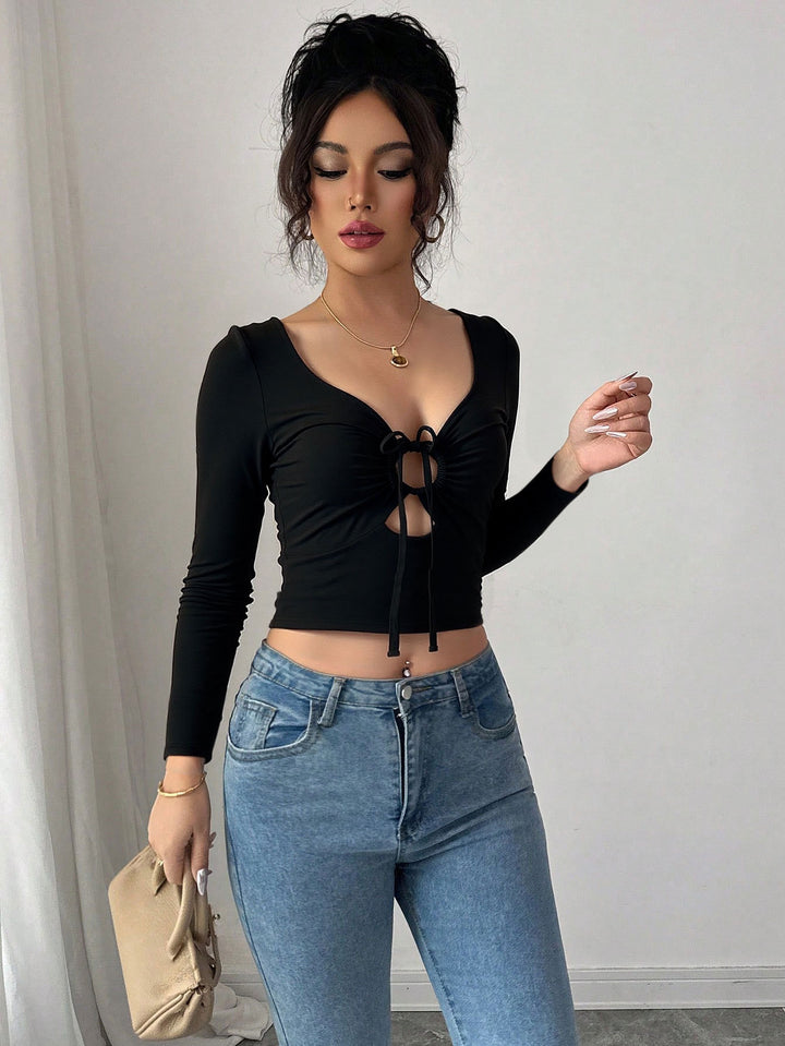Haut court femme avec nœud décoratif et manches longues Levoire