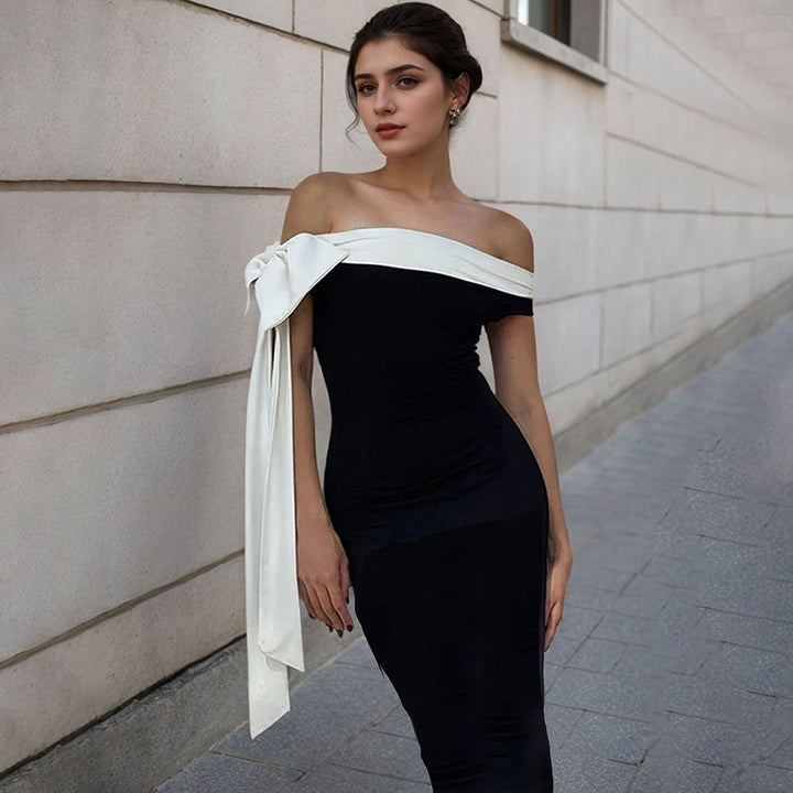 Robe Maxi Femme avec un design chic à épaules nues et un accent élégant en nœud Levoire