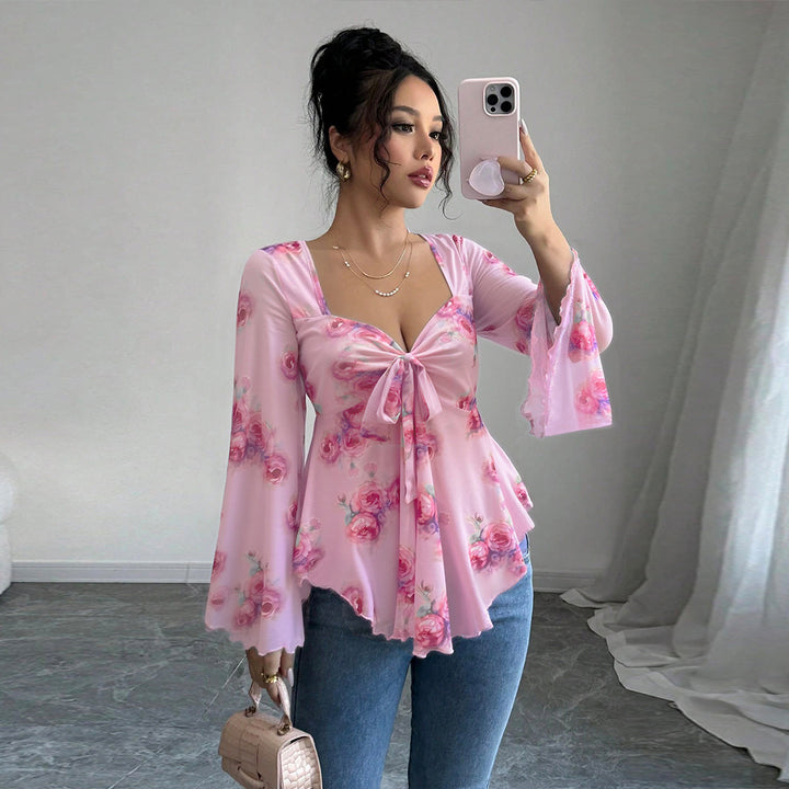 Blouse femme fluide avec design floral et nœud ludique Levoire
