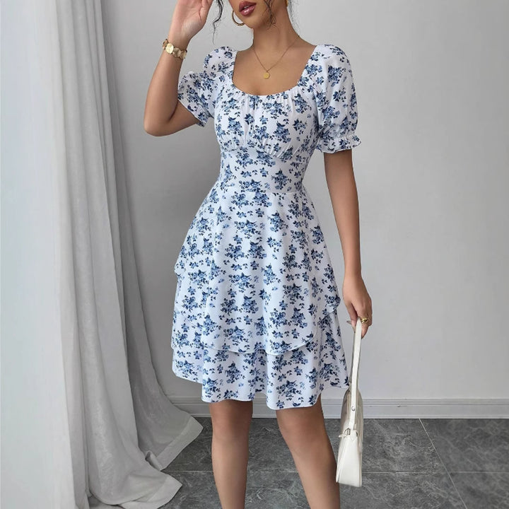 Robe mini imprimée de fleurs pour femmes avec des manches bouffantes volumineuses et un ourlet swing