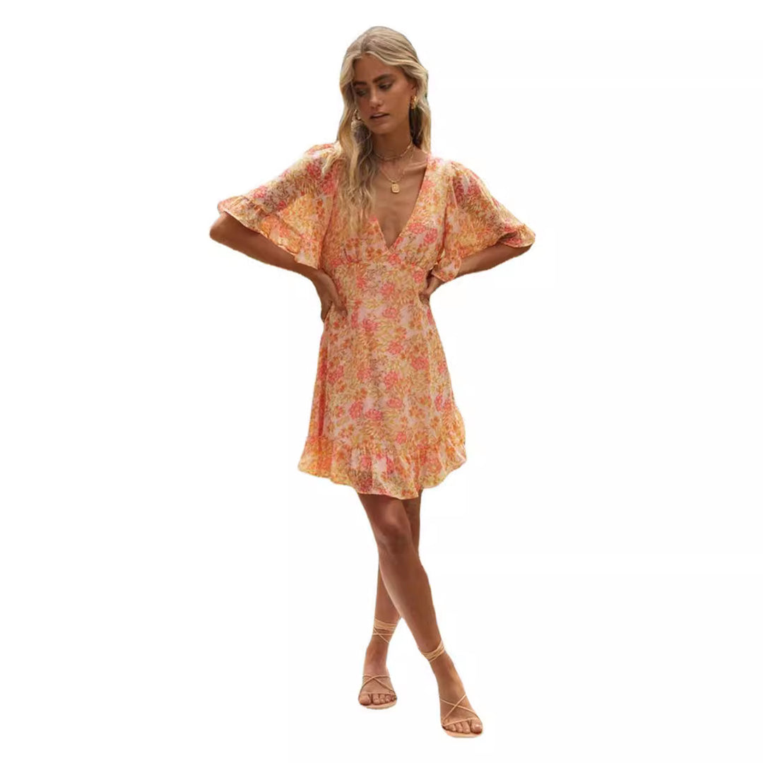 Robe portefeuille mini pour femme avec des manches volumineuses et découpe romantique au dos Levoire