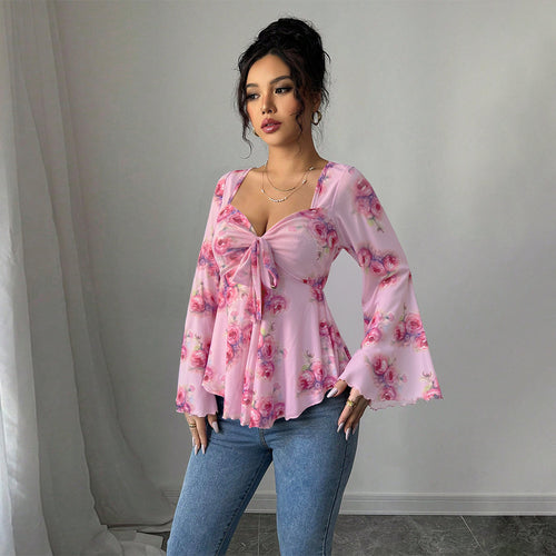 Blouse femme fluide avec design floral et nœud ludique Levoire