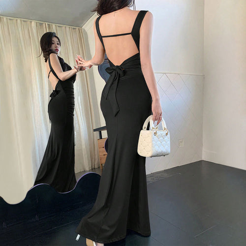 Robe de soirée élégante pour femmes avec découpes arrière raffinées et ceinture décorative à nouer Levoire