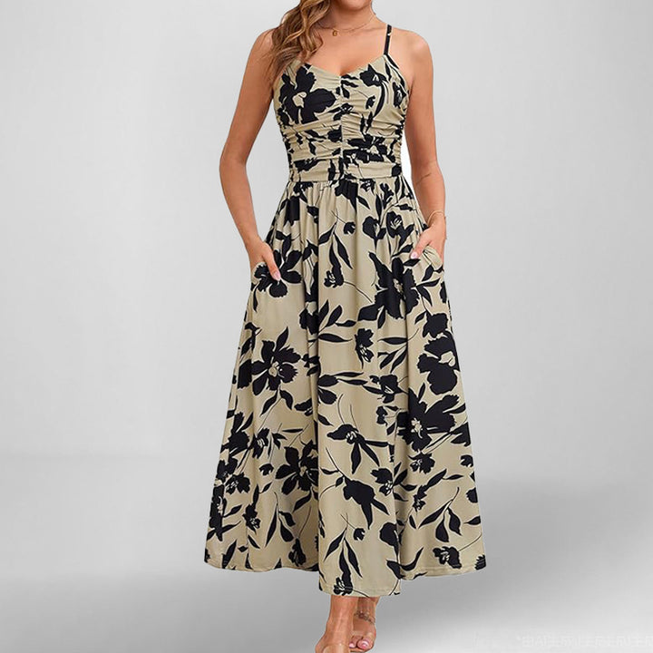 Robe maxi femme avec fines bretelles et poches latérales pratiques Levoire