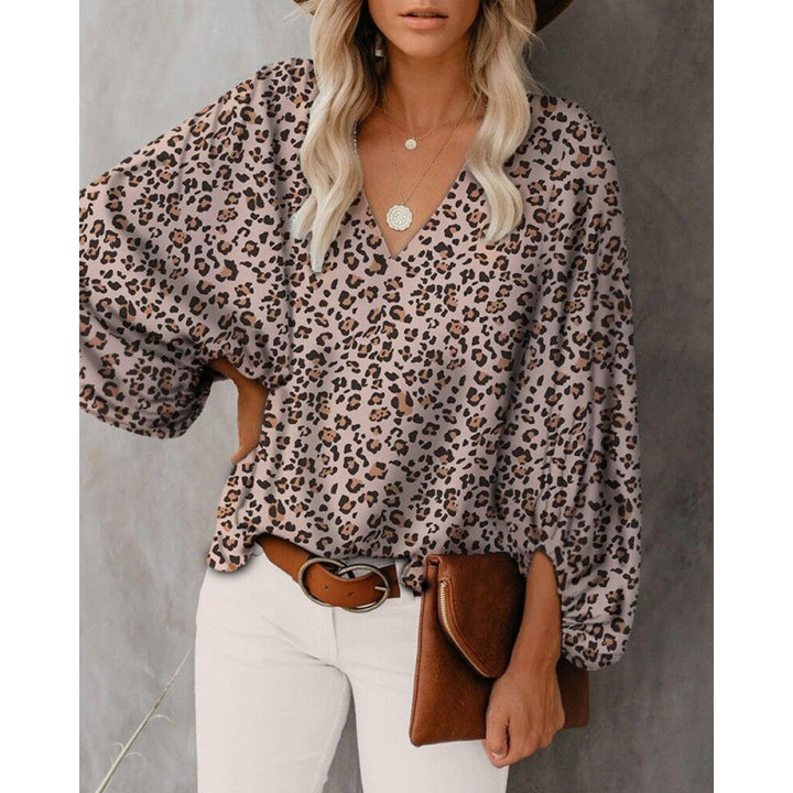 Blouse féminine à la mode avec des manches larges et un col en V Levoire