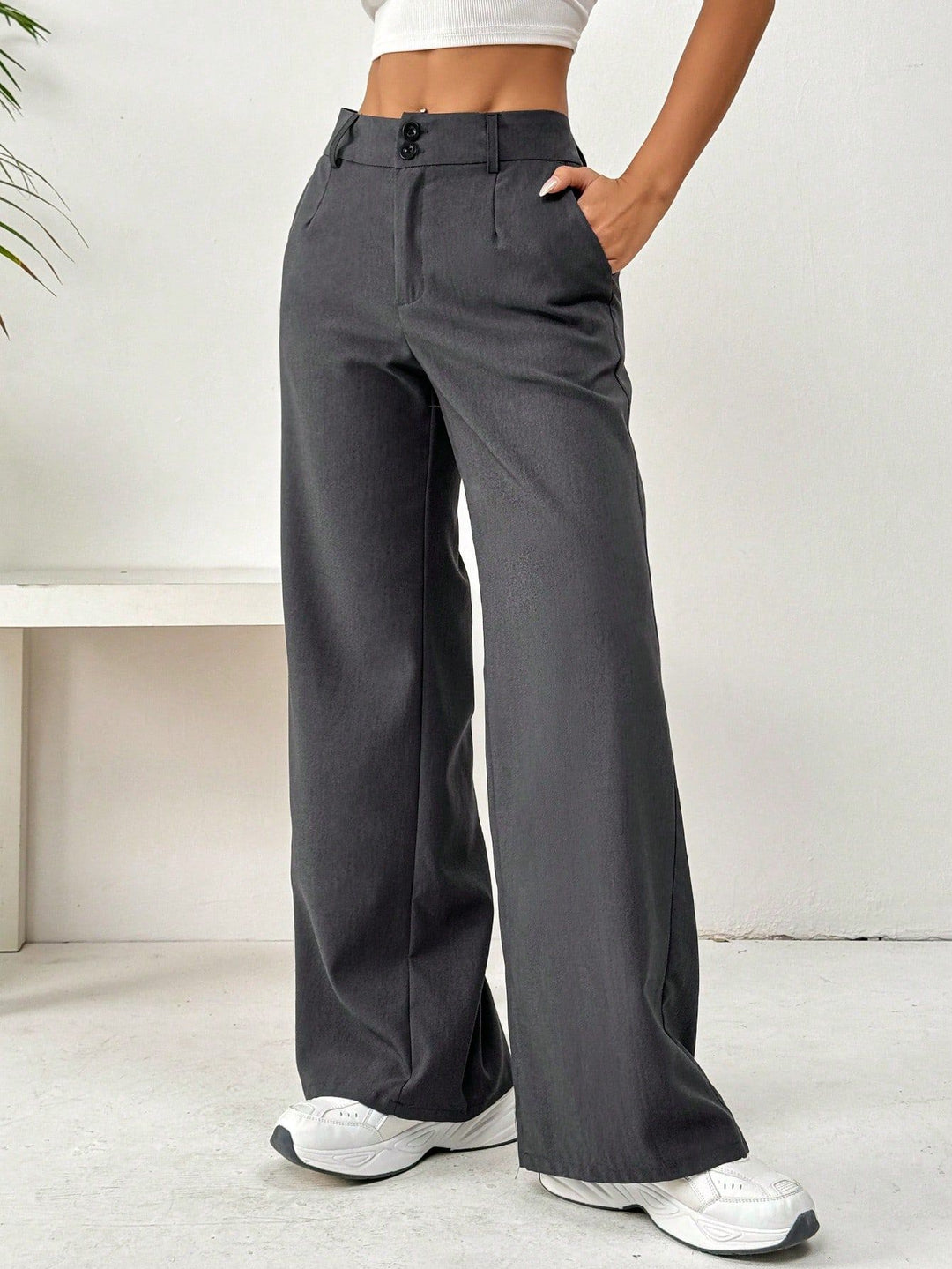 Pantalons larges décontractés pour femmes avec taille haute et élégants détails de boutons Levoire