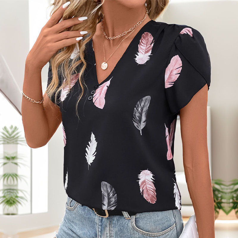 Haut féminin avec motif floral en feuilles et détails de boutons décoratifs Levoire