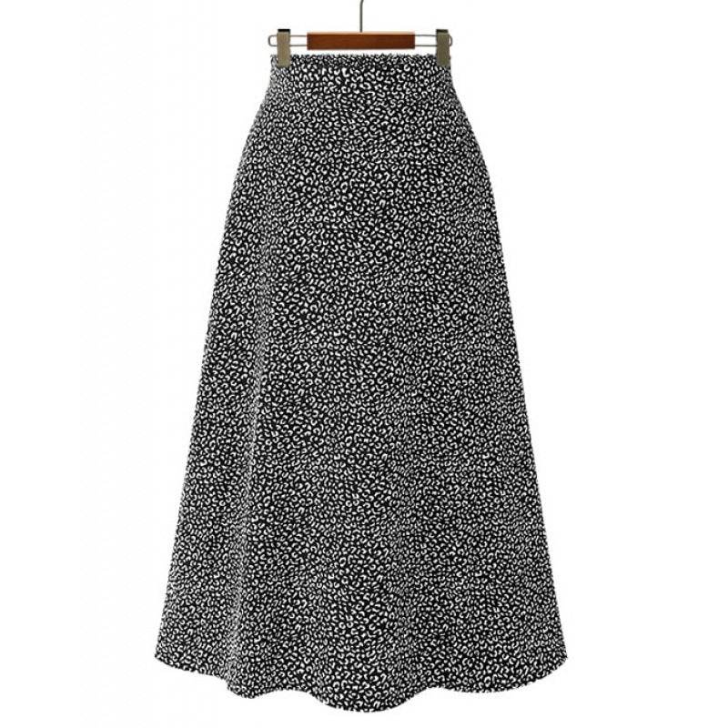 Jupe midi pour femmes avec une coupe élégante en A et un design à pois à la mode Levoire