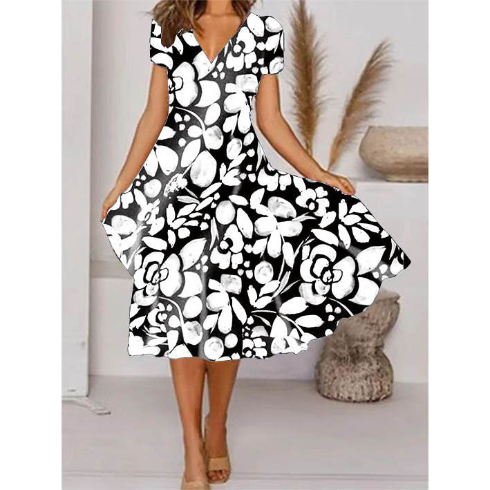 Levoire | Robe à manches courtes avec décolleté en V à imprimé floral élégant noir