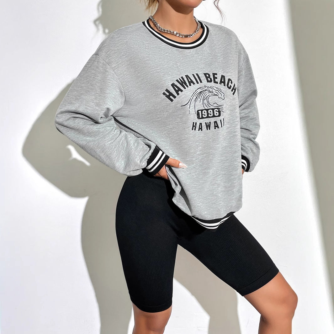 Sweatshirt décontracté pour femmes avec motif imprimé Hawaii et épaules tombantes Levoire