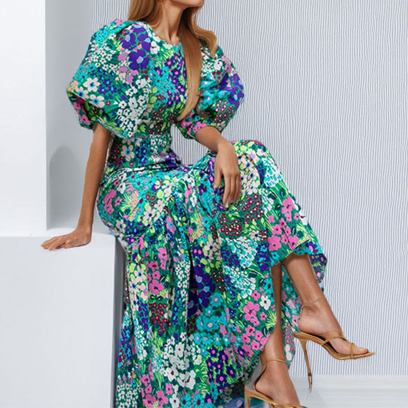 Robe maxi pour femmes avec des manches bouffantes volumineuses et des motifs floraux Levoire