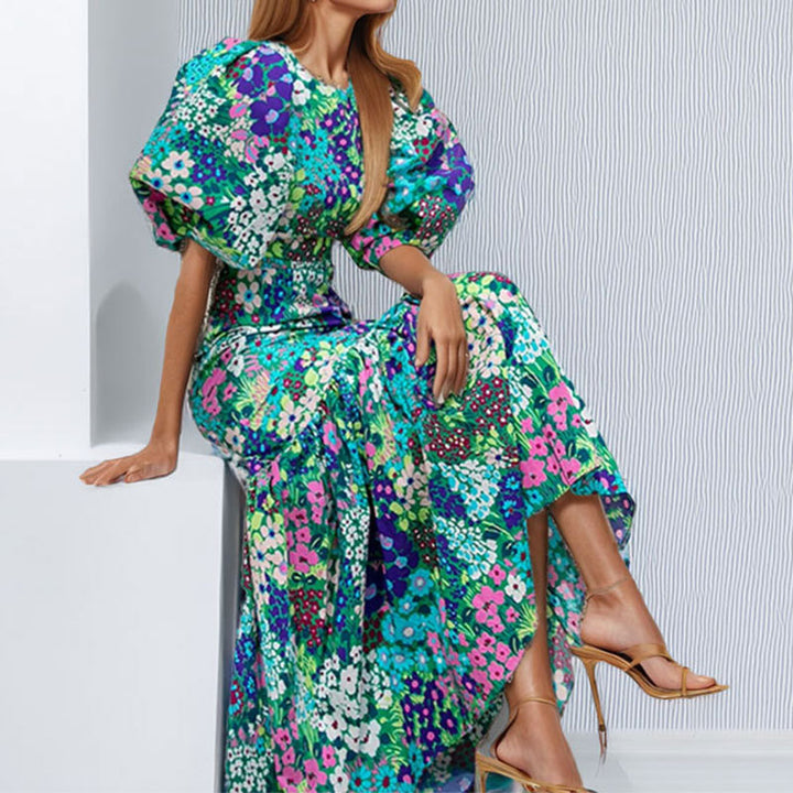 Robe maxi pour femmes avec des manches bouffantes volumineuses et des motifs floraux Levoire