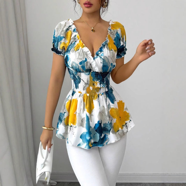Blouse femme avec volants floraux et taille élastique Levoire