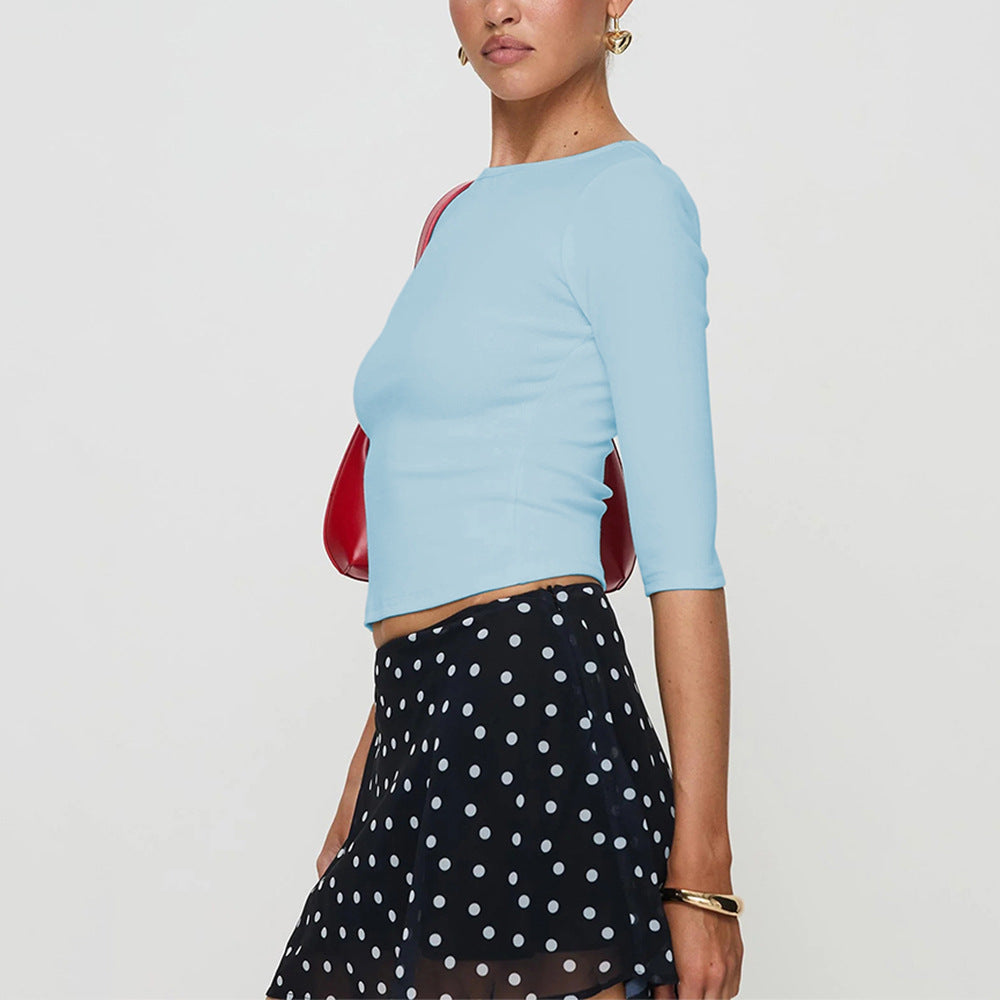 Chemise à manches longues cropped pour femmes avec un décolleté rond élégant et une coupe qui met en valeur la silhouette Levoire