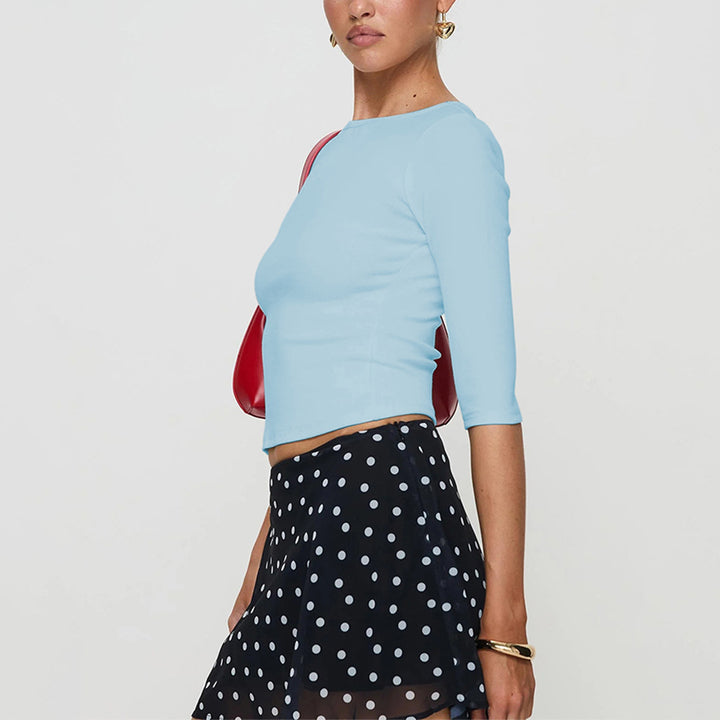 Chemise à manches longues cropped pour femmes avec un décolleté rond élégant et une coupe qui met en valeur la silhouette Levoire