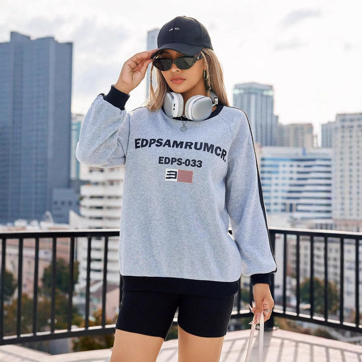 Sweat-shirt décontracté pour femmes avec impression graphique et manches contrastées Levoire