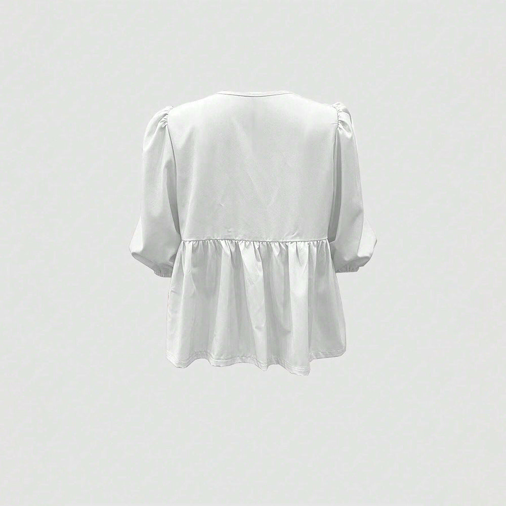 Blouse pour femmes avec des détails de volants ludiques et une coupe décontractée Levoire