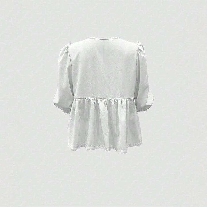 Blouse pour femmes avec des détails de volants ludiques et une coupe décontractée Levoire