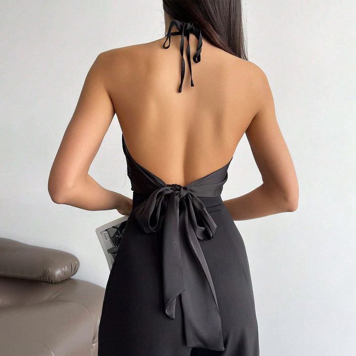Haut halter élégant pour femmes avec tissu brillant et nœud décoratif Levoire